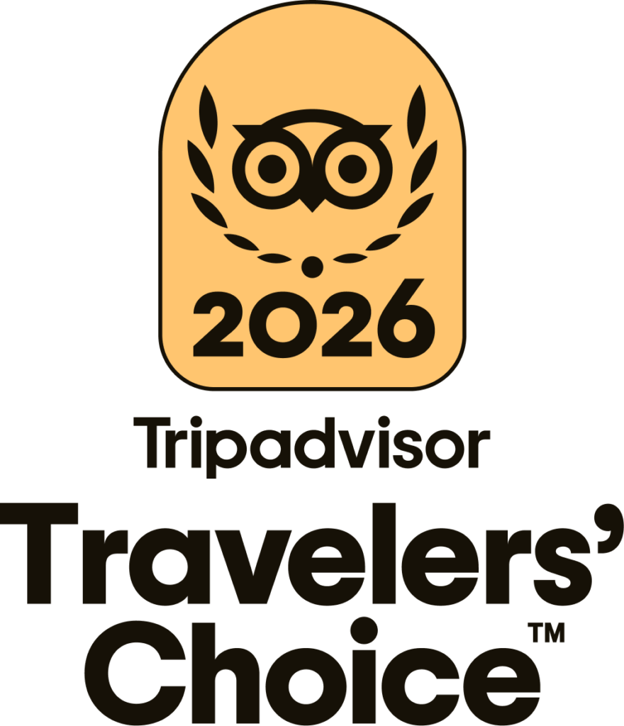 Tripadvisor Travelers’ Choice 2026 award badge featuring a stylized owl icon inside an arched crest.